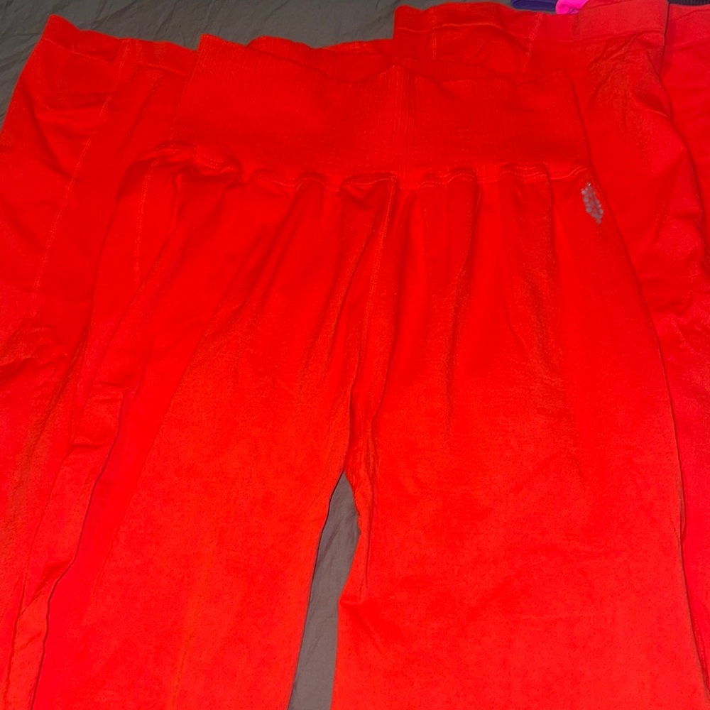 NWOT FP Good Karma Flare Leggings orange/red WITH LOGO